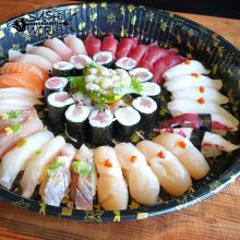 Cheers to the New Year Sushi Party Platter Bluefin Tuna Jumbo Scallops Rolls Red Snapper Yellowtail Belly